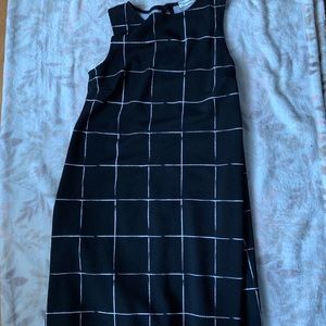 Black dress with square detailing